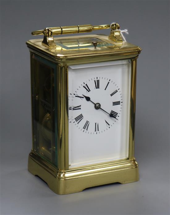 A brass cased carriage clock